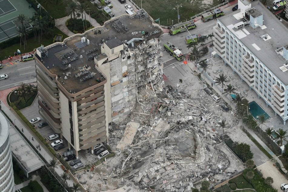 An aerial view showed the 12-story oceanfront Champlain Towers South Condo that collapsed around 2AM on Thursday.