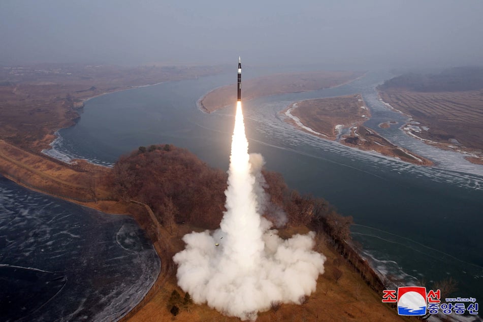 A North Korean missile flies during what state media KCNA says is a test of a new intermediate-range hypersonic ballistic missile at an undisclosed location on January 6, 2025.