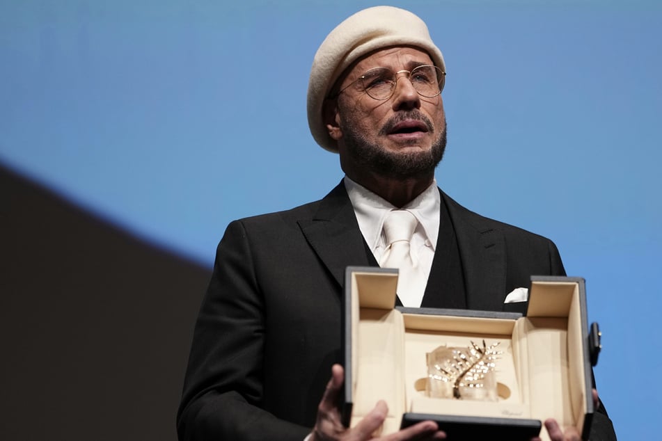 "Größer als ein Oscar": John Travolta erhält in Cannes die Goldene Ehrenpalme