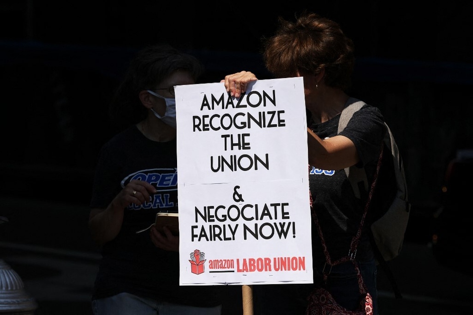 Pro-union protestors gather for a rally near Amazon CEO Jeff Bezos' Fifth Avenue penthouse in New York City.