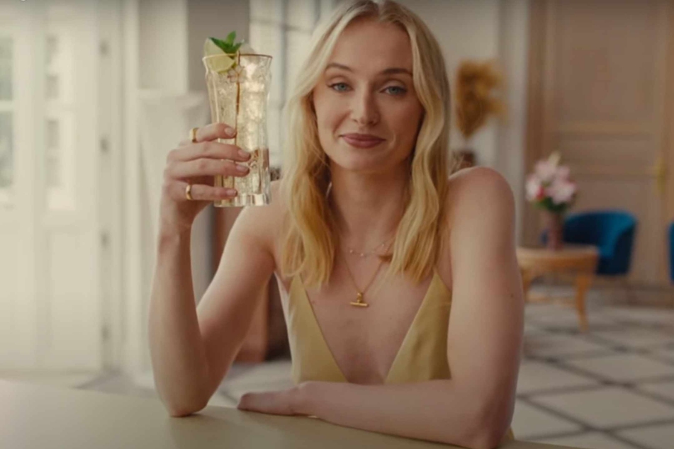 St. Germain's campaign branding includes phrases like "sip into something fresher this summer," alluding to Sophie Turner being ready for something new and better in her life.