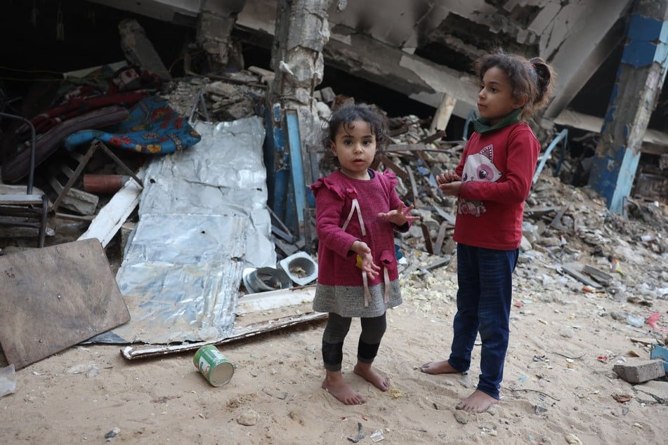 Palestinian children displaced from their homes are pictured in the school where they took refuge in Khan Yunis in the southern Gaza Strip on December 28, 2024, amid the ongoing Israel-Gaza war.