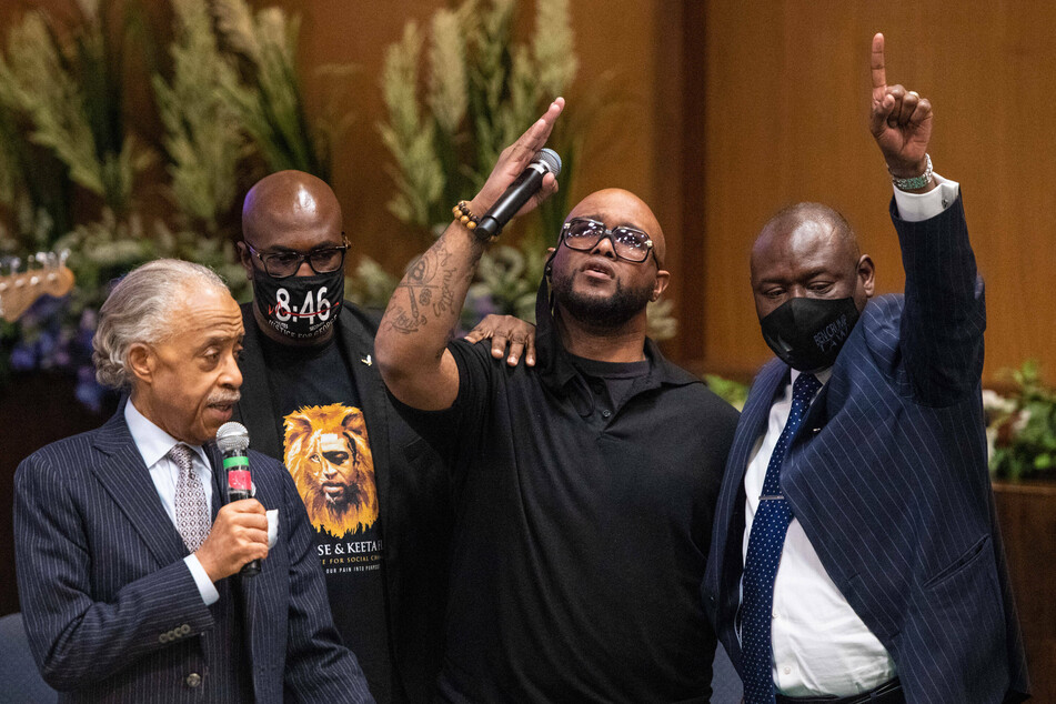 Civil rights icon Rev. Al Sharpton; George Floyd's brothers Terrence and Philonise; and civil rights attorney Ben Crump (l.-r.) spoke at a prayer vigil and rally for George Floyd.
