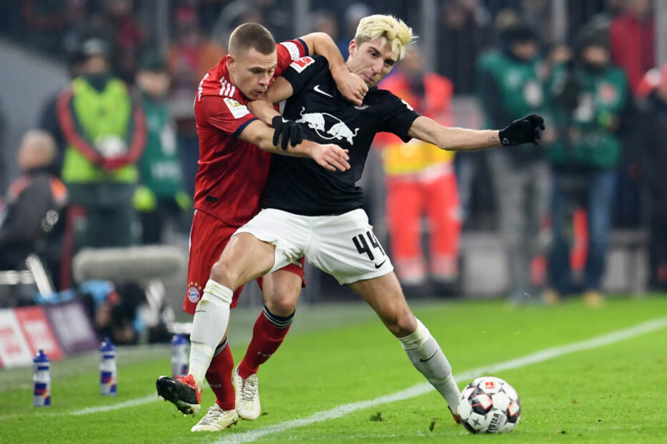Wird dieses Mal leider nicht dabei sein: RBs Mittelfeldspieler, hier im Zweikampf mit Münchens Joshua Kimmich, der vor seinem Wechsel zu den Bayern ebenfalls in Leipzig spielte.