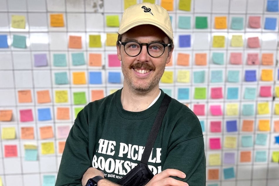 Matthew Chavez, founder of the Subway Therapy project, poses at the 14th St/6th Ave station bypass in New York City.