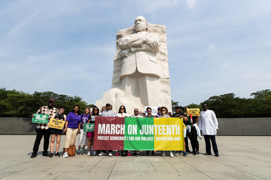Racial justice advocates march for reparations, voting rights, and gun control in Washington DC on Juneteenth 2023.