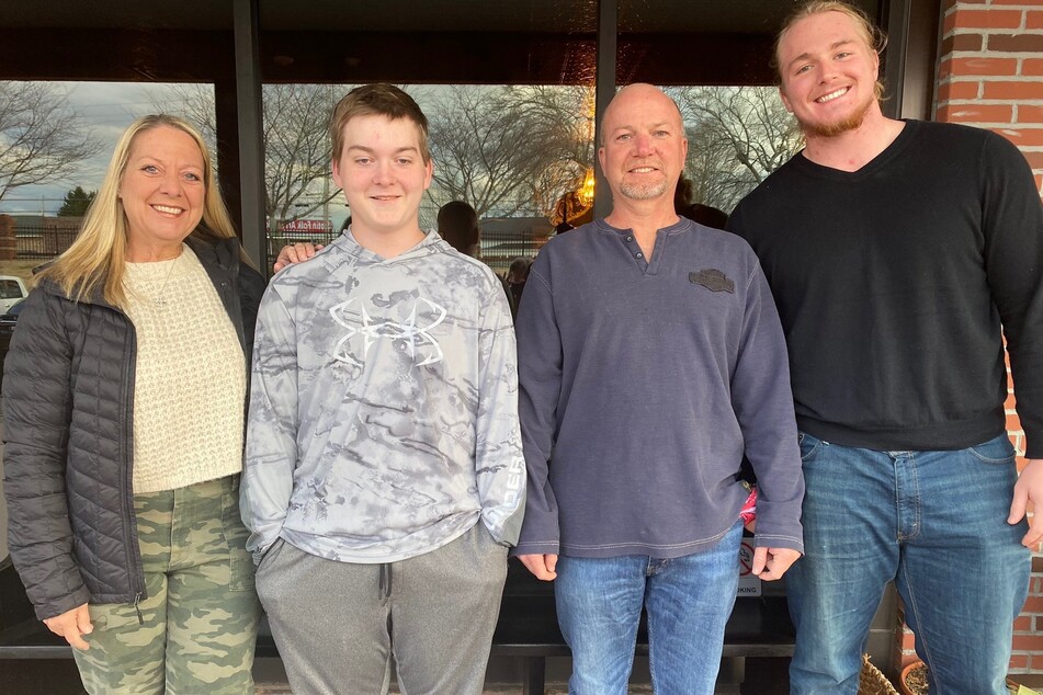 Harry Miller captured with his Mom, Dad, and younger brother.