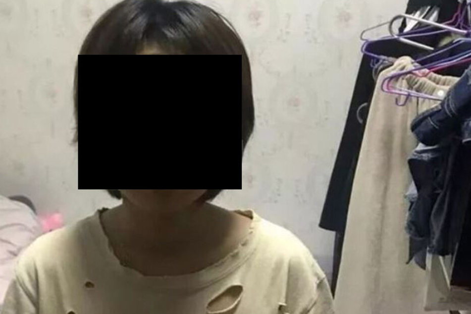Seine Mutter (28), Frau Ye, nach der Festnahme.