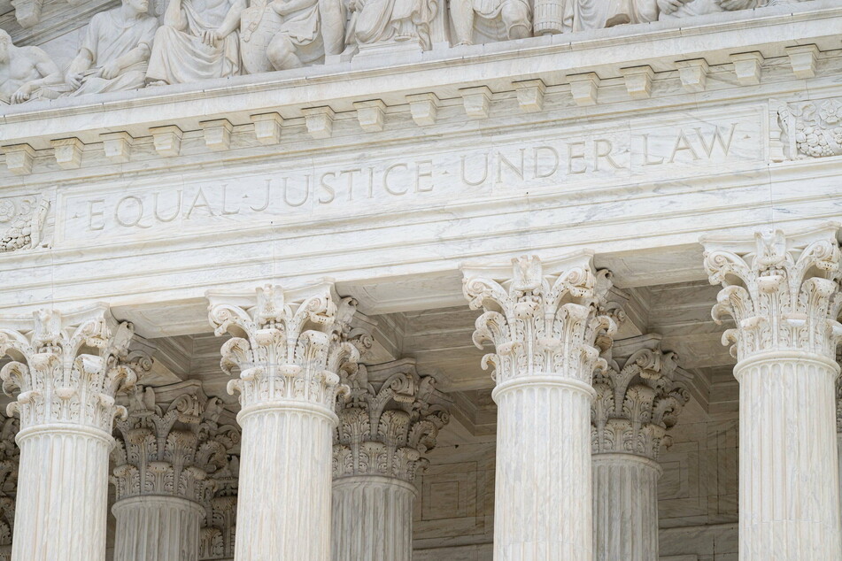 An inscription above the US Supreme Court building in Washington DC reads "Equal Justice Under Law."