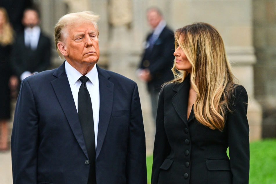 Donald Trump with his wife Melania as they depart the funeral for Amalija Knavs, in Palm Beach, Florida on January 18, 2024.