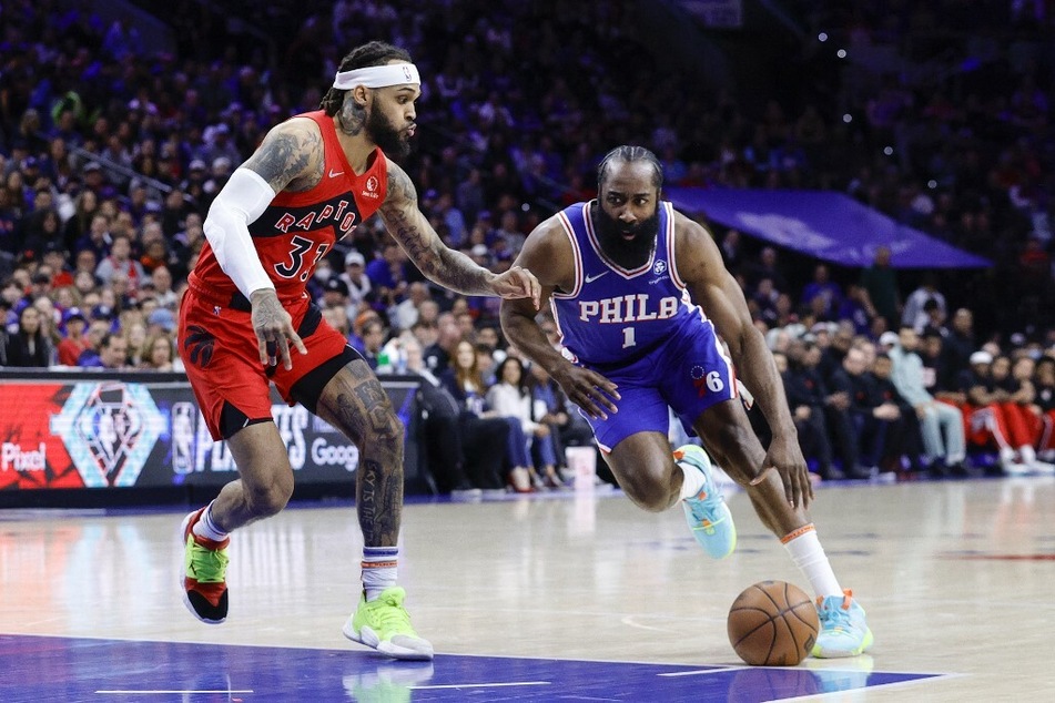James Harden (r) of the Philadelphia 76ers drives against Gary Trent Jr. of the Toronto Raptors during the Eastern Conference playoffs.