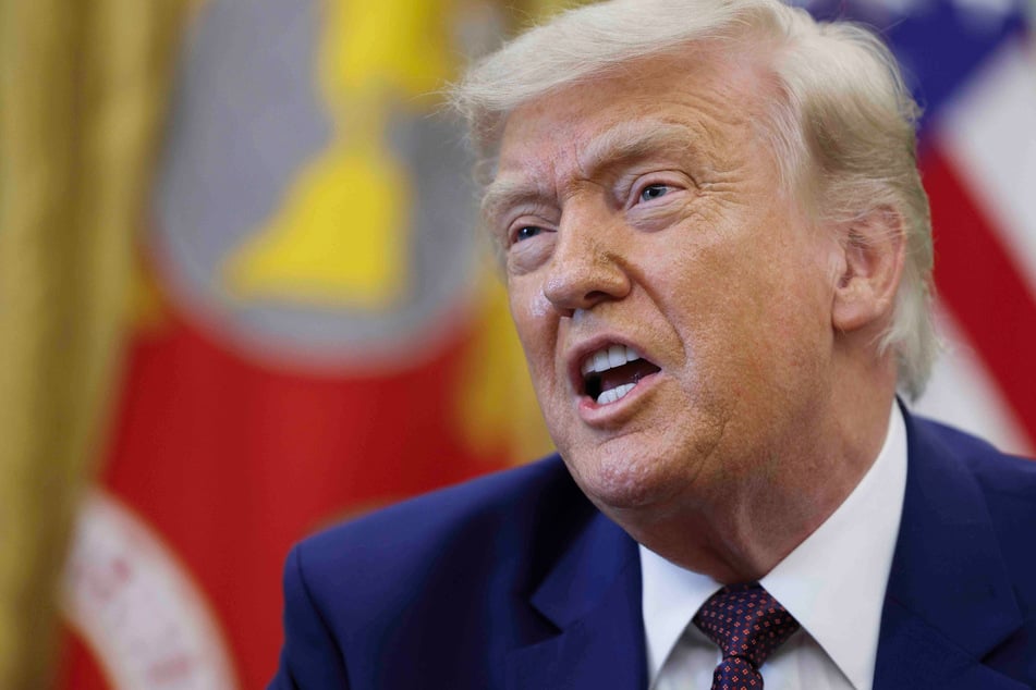 Trump signs order stripping job protections from 8,000 federal workers