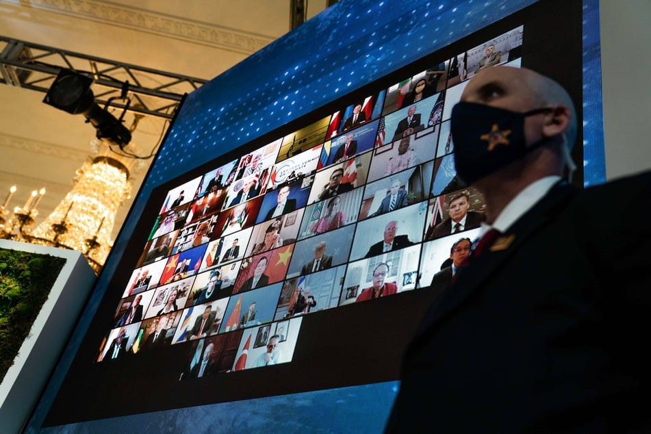 World leaders were displayed on a giant screen in the White House.