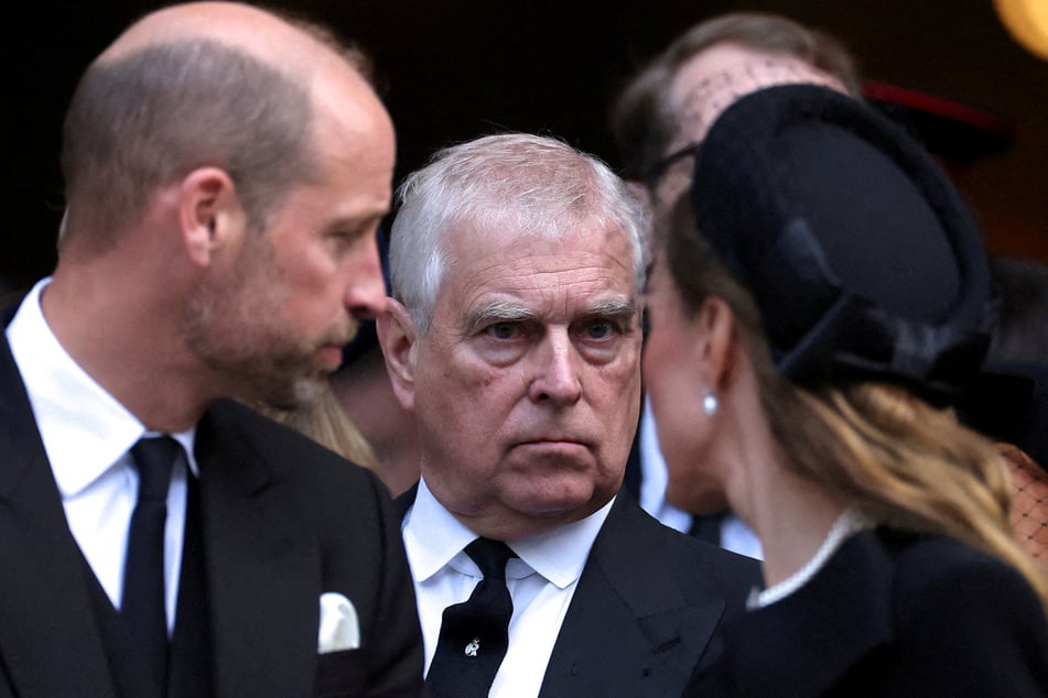 Britain's then Prince Andrew stands next to Prince William and his wife Catherine, Princess of Wales, as they leave Westminster Cathedral on the day of the funeral of Katharine, Duchess of Kent, on September 16, 2025.