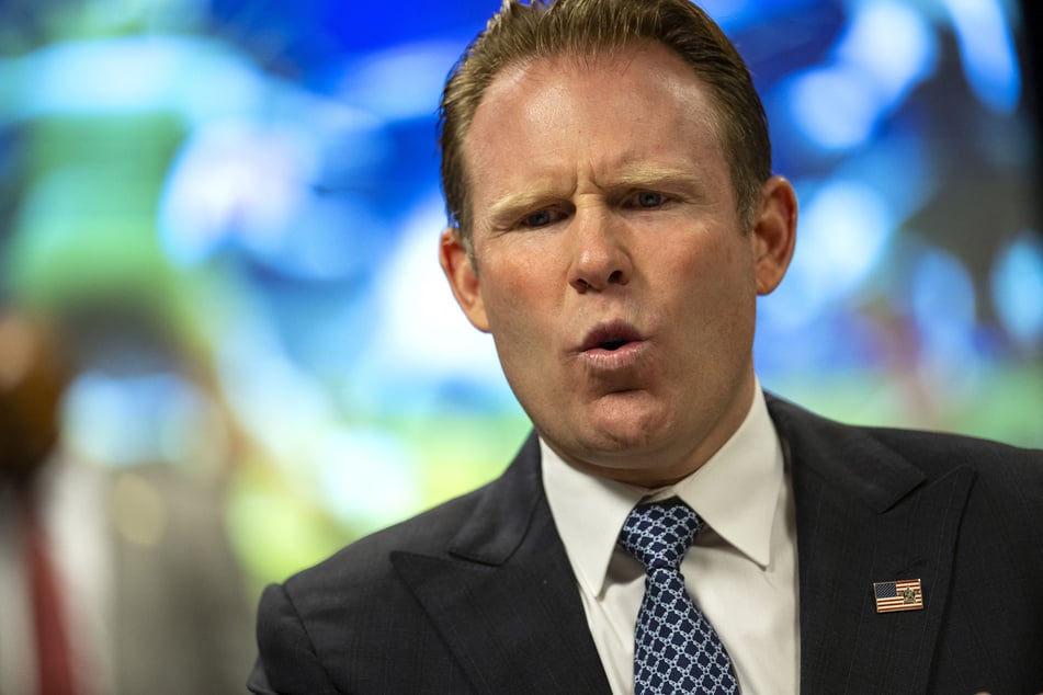 Andrew Giuliani, executive director of the White House Task Force on the FIFA World Cup 2026, speaks with law enforcement members during a press tour of the International Police Cooperation Center in Leesburg, Virginia, on June 29, 2026.