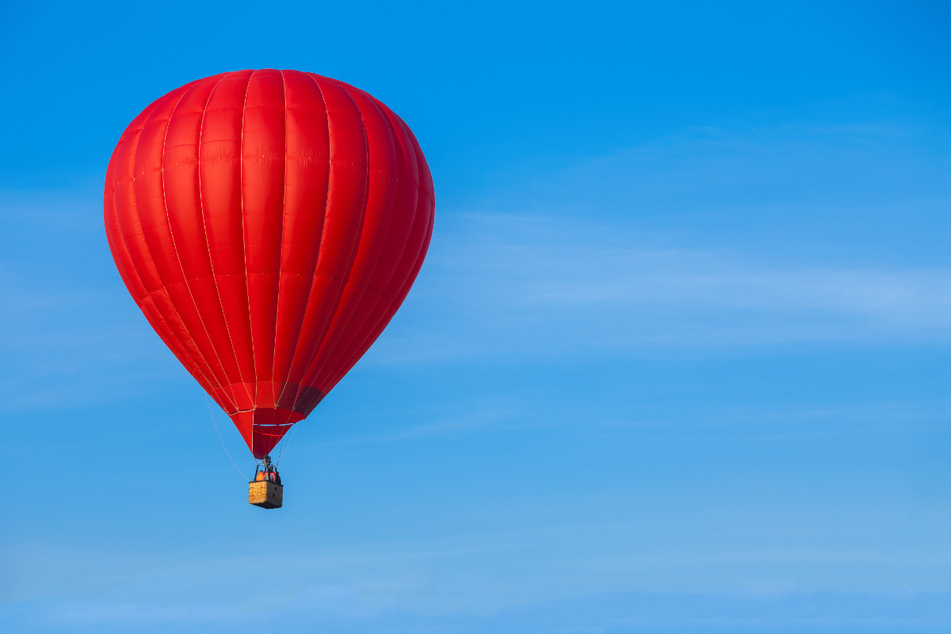 The hot air balloon hit a power line as witnesses nearby heard an explosion (stock image).