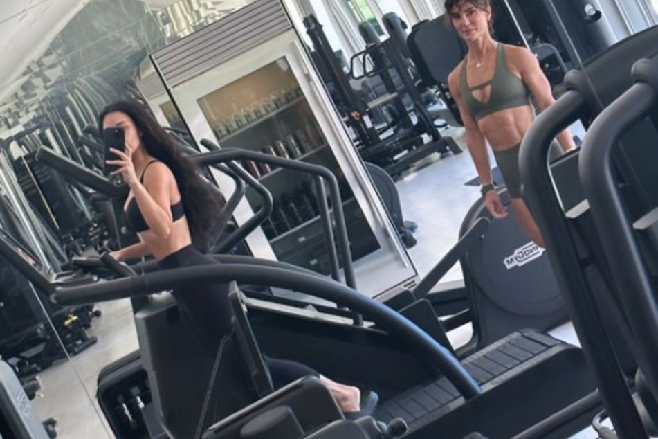 Kim Kardashian hit the gym after breaking her shoulder weeks ago.