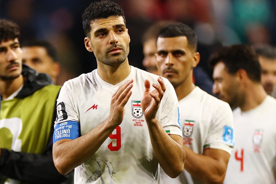 Iran's Mehdi Taremi applauds fans after their World Cup match against Egypt on June 26, 2026.