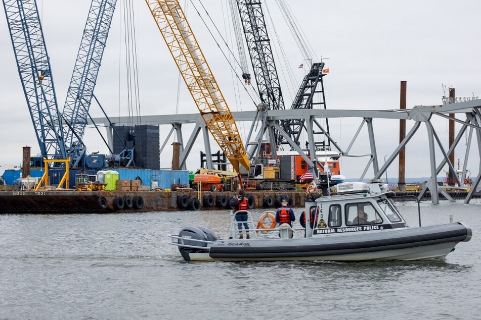 Debris is cleared from the collapsed Francis Scott Key Bridge as efforts begin to reopen the Port of Baltimore.