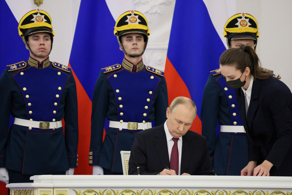 Russian President Vladimir Putin signs documents designating the formal annexation of four Ukrainian regions.