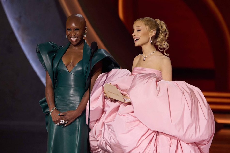 Ariana Grande (r.) and Cynthia Erivo present the Oscar award for Original Song at the Dolby Theatre at Ovation Hollywood on Sunday, March 10.