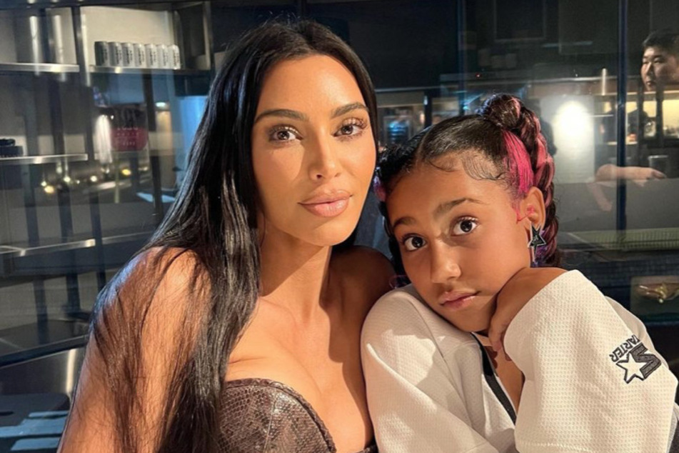 Kim Kardashian's daughter North West (r) apparently scams friends and family who visits her weekend lemonade stand.
