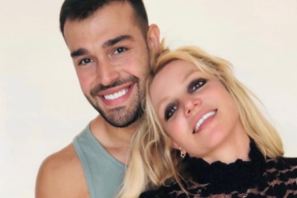 Britney Spears squashed rumors that she and Sam Ashagri were having marital issues after fans noticed he'd been absent from her recent IG posts.