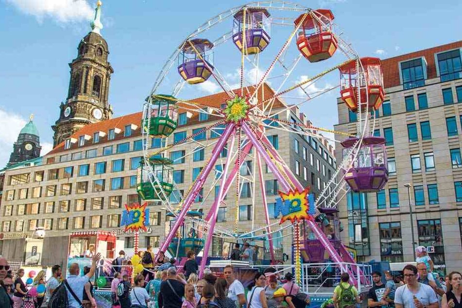 Ob Riesenrad mit der ganzen Familie oder abends ein Weinchen trinken - geht alles auf dem Dresdner Stadtfest.