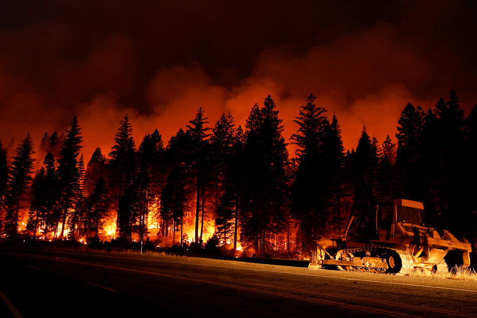 Authorities continue to battle the massive Park Fire outside Chico, California, with bulldozers being brought in to assist firefighting efforts.