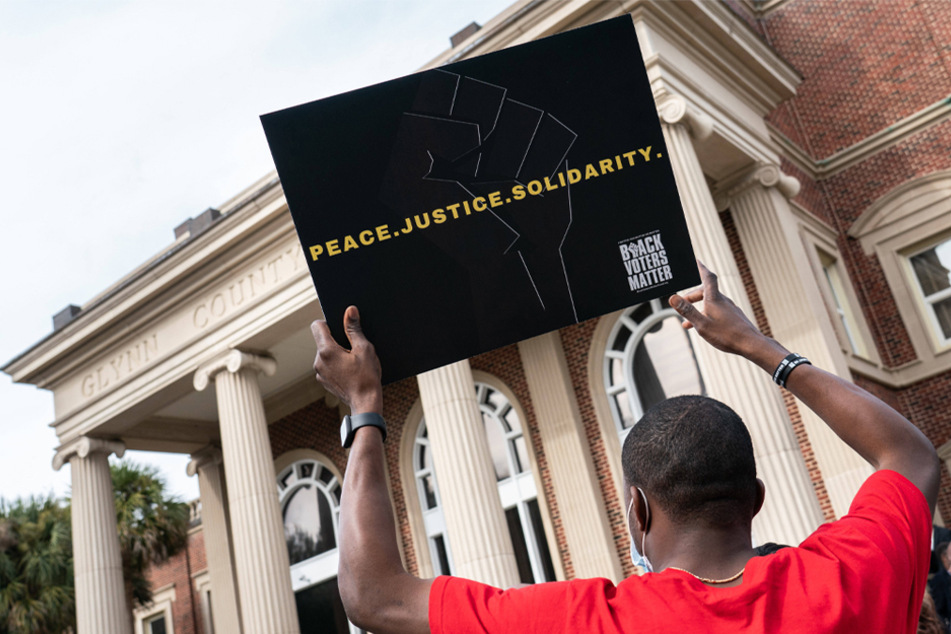 Protestors held signs outside the courthouse nearly every day of the trial.