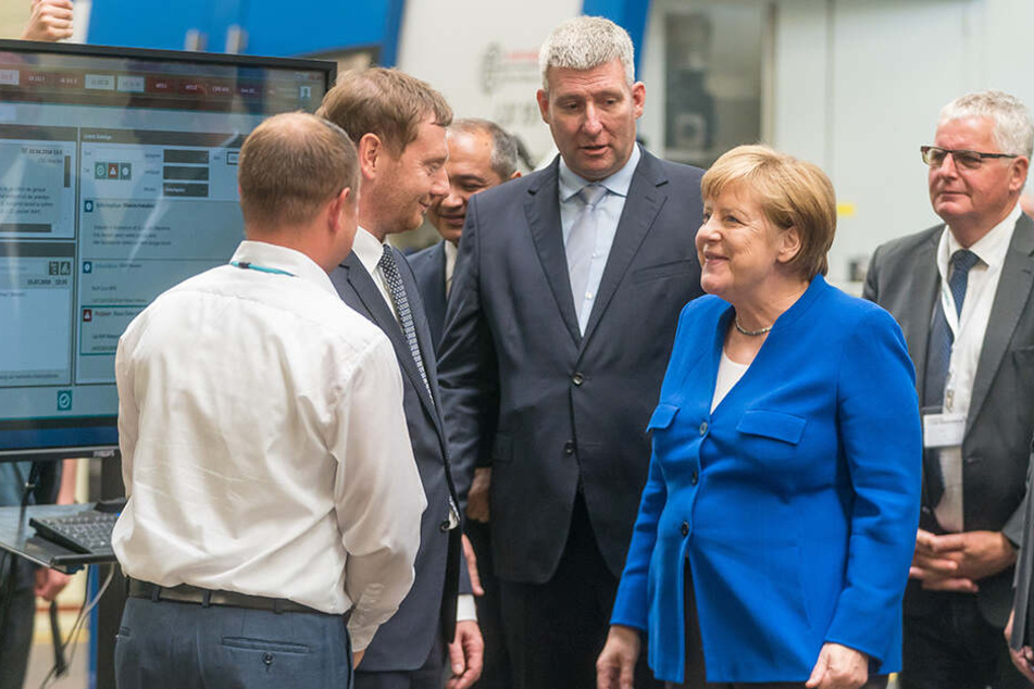 Angela Merkel und Michael Kretschmer im Siemens-Turbinenwerk in Görlitz.