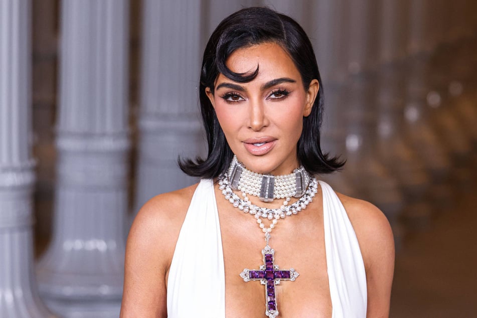 Kim Kardashian's new mystery man is said to be a real estate investor who she met through mutual friends.