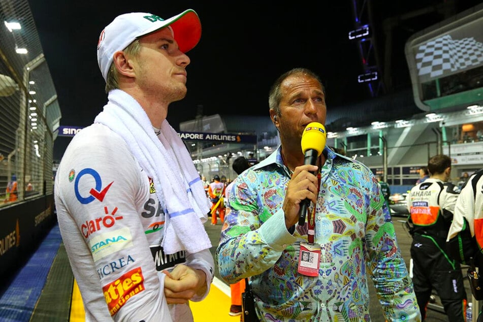 RTL-Moderator Kai Ebel trägt das GERMENS Hemd CARROUSEL während der Formel 1 in Singapore, 2014. Er ist im Gespräch mit Rennfahrer Nico Hülkenberg.