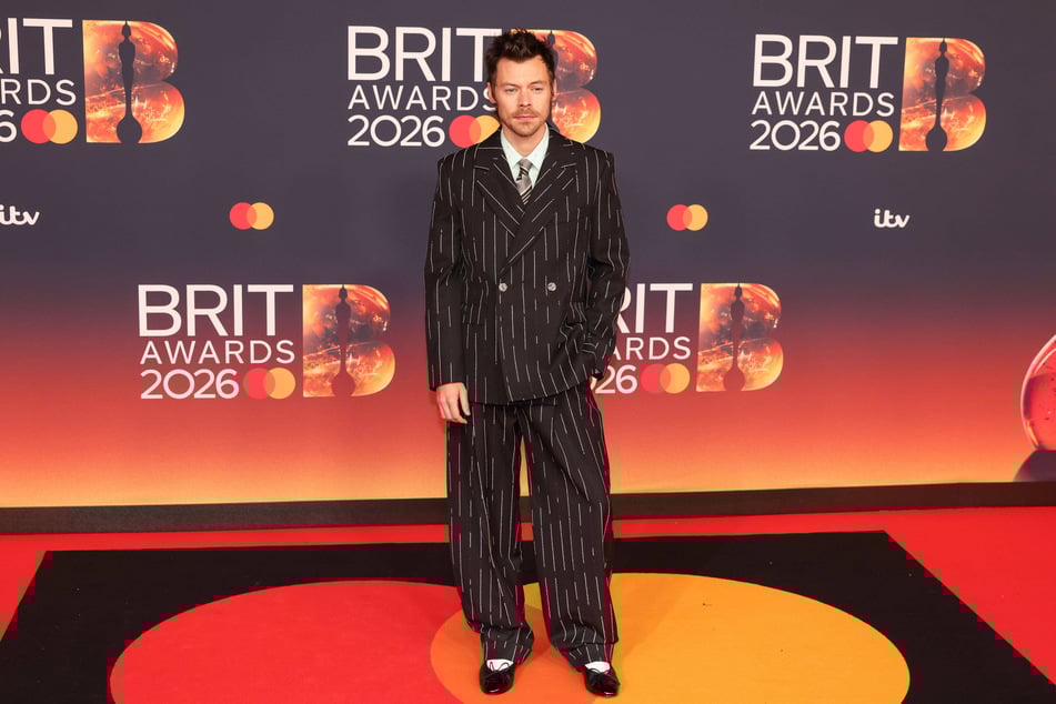 Harry Styles wore a Chanel pinstripe suit at Saturday's BRIT Awards.