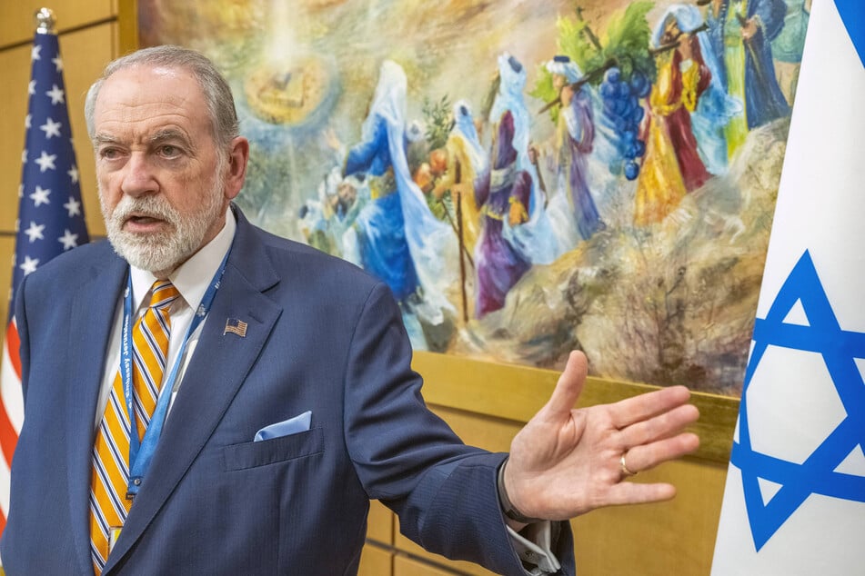 US Ambassador to Israel Mike Huckabee speaks in his Jerusalem office in the United States embassy building.