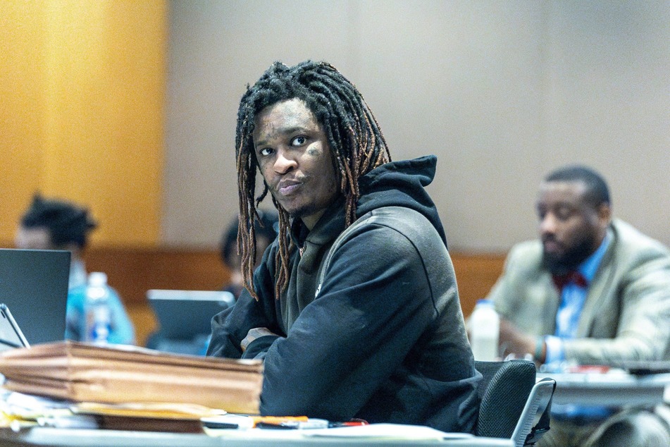 Young Thug listens to the jury selection in the Young Slime Life gang case at the Fulton County Courthouse.