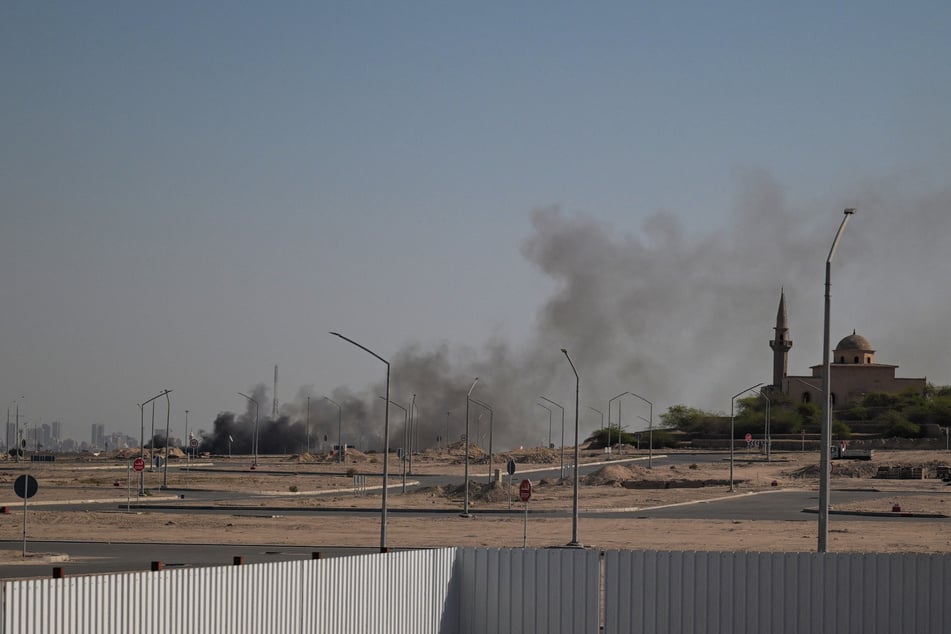 US embassy in Kuwait says "do not come" as smoke rises from compound amid Iranian strikes