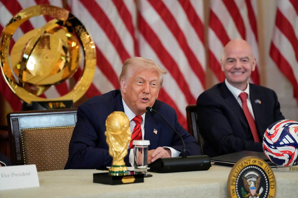 President Donald Trump (l.) and FIFA president Gianni Infantino attend a meeting of the FIFA Task Force at the White House on May 6, 2025.
