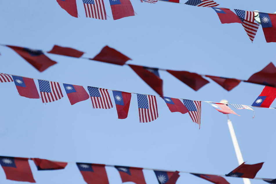 US and Taiwanese flags seen waving in Chinatown, San Francisco.