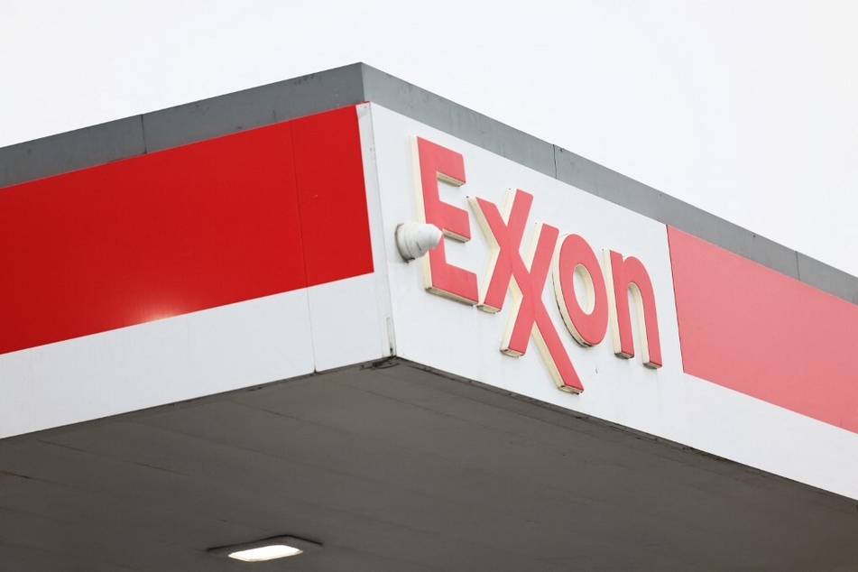 Exxon Mobil is taking legal measures to try to block a proposal from environmental activist investors to reduce greenhouse gas emissions.