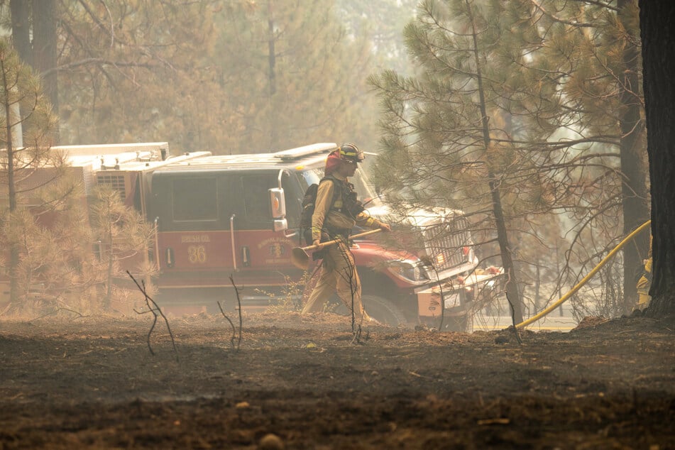 California firefighters say they are exhausted after dealing will an onslaught of large-scale blazes and evacuation attempts.