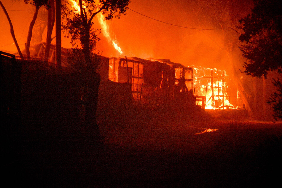 Tents and shelters burning in the fire at the refugee camp in Moria on the island of Lesbos.