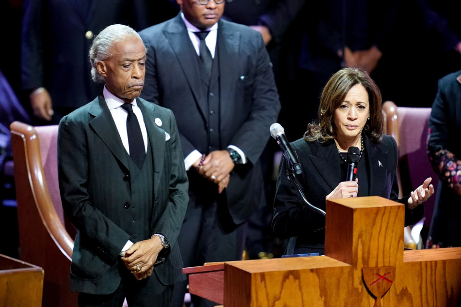 Reverend Al Sharpton watches on as Vice President Kamala Harris calls on Congress to pass the George Floyd Justice in Policing Act.