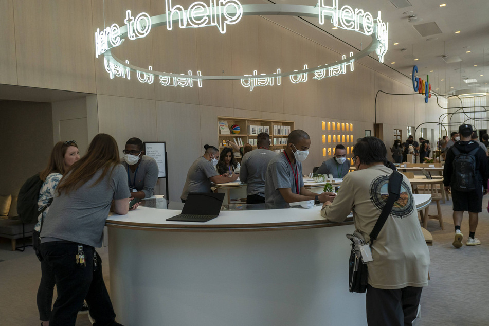Visitors at the Google Store in New York sample and buy smartphones and other devices.