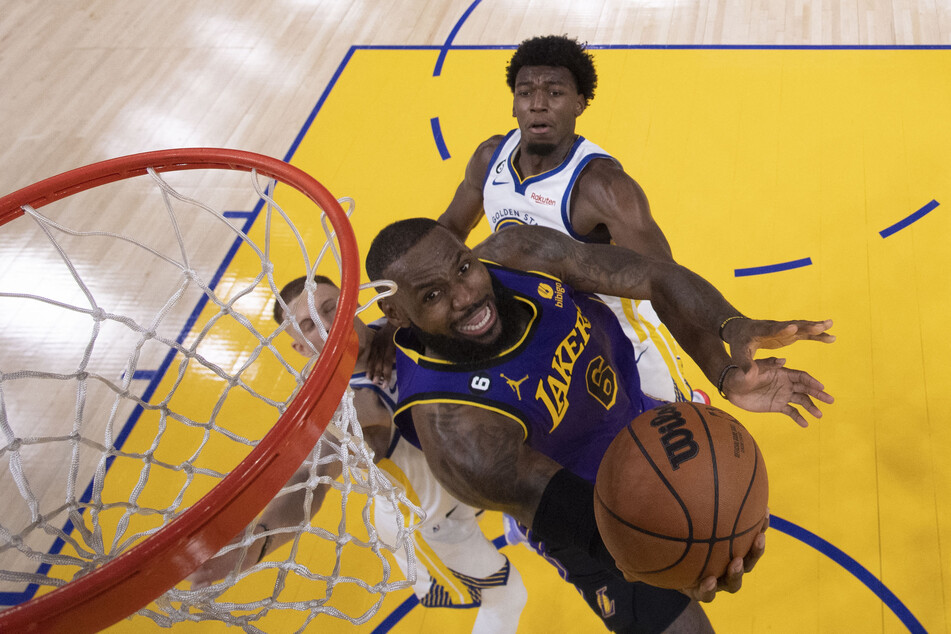 LeBron James rises to score for the Lakers against the Warriors.