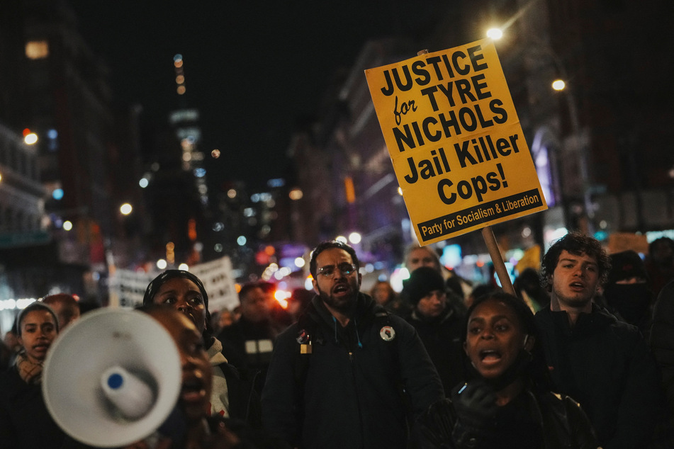 People take part in a protest following the release of a video showing Memphis police officers beating Tyre Nichols, a 29-year-old Black man who died three days later, in New York City.