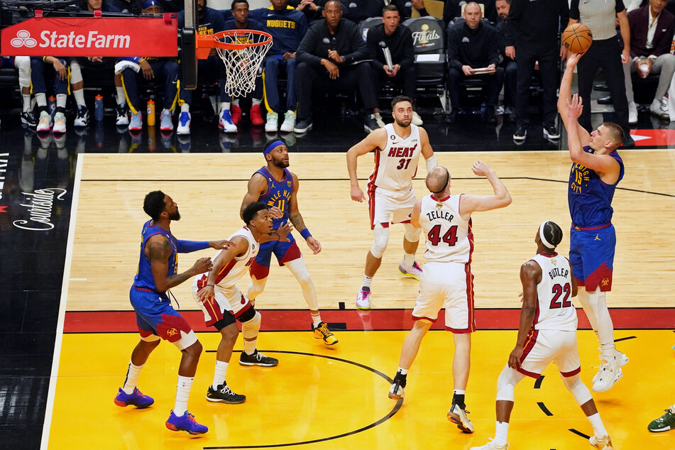 Denver Nuggets center Nikola Jokic shoots the ball against the Miami Heat during the first half in Game 3 of the 2023 NBA Finals at Kaseya Center.