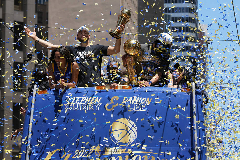 Curry and his Warriors teammates went on an open-top bus parade.