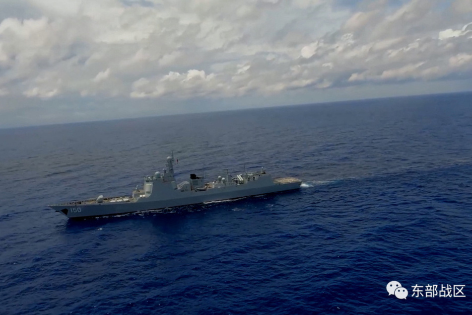 A China's People's Liberation Army Navy Force destroyer takes part in military exercises in the waters around Taiwan.