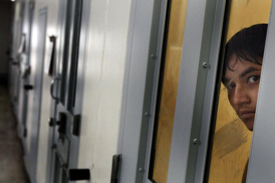 An inmate waits in solitary confinement at the Val Verde Correctional Facility in Del Rio, Texas.